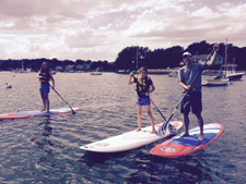 Group going paddleboarding.