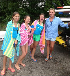 Great family activity. Family group doing stand up and paddle on Cape Cod.